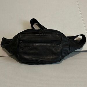 Vintage Black Leather waist pack. 3 separate zippered pouches.Soft leather.